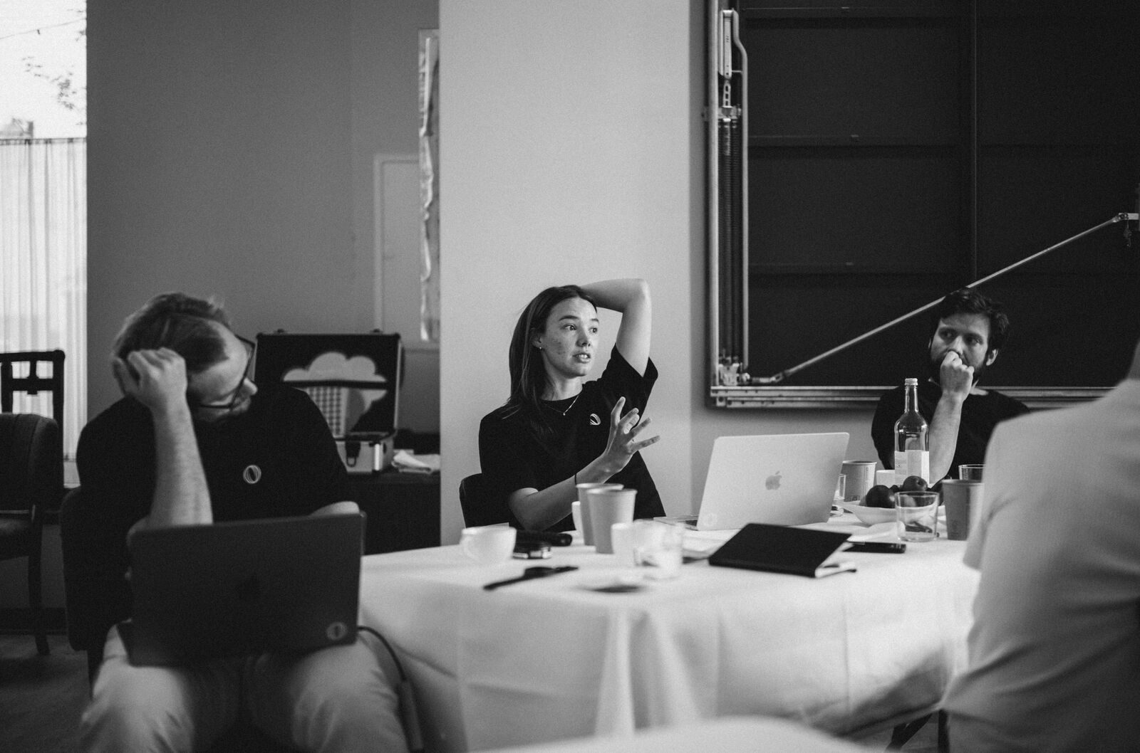 The Polar team in discussion around a table at our offsite in Berlin